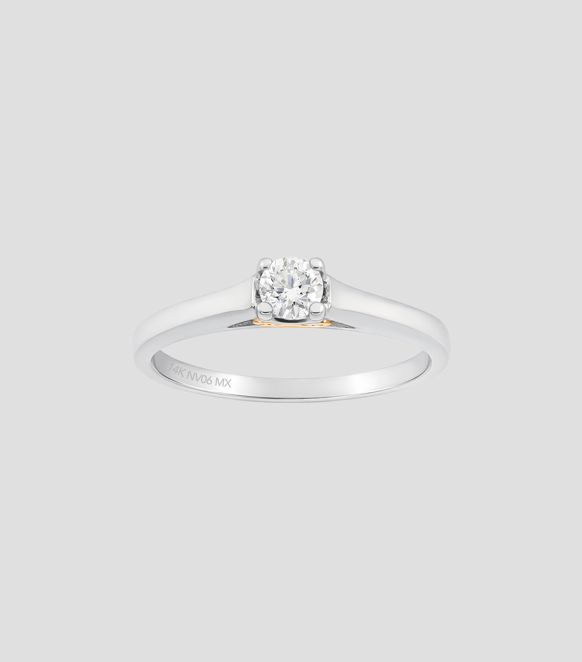 Anillo solitario en Oro combinado de 14 Kilates con diamante Mujer